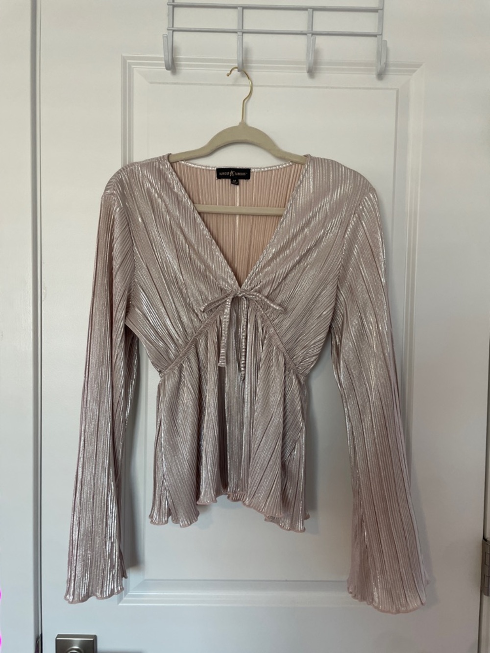 Almost Famous Shimmery Pleated Tie-Front Blouse in Blush Pink